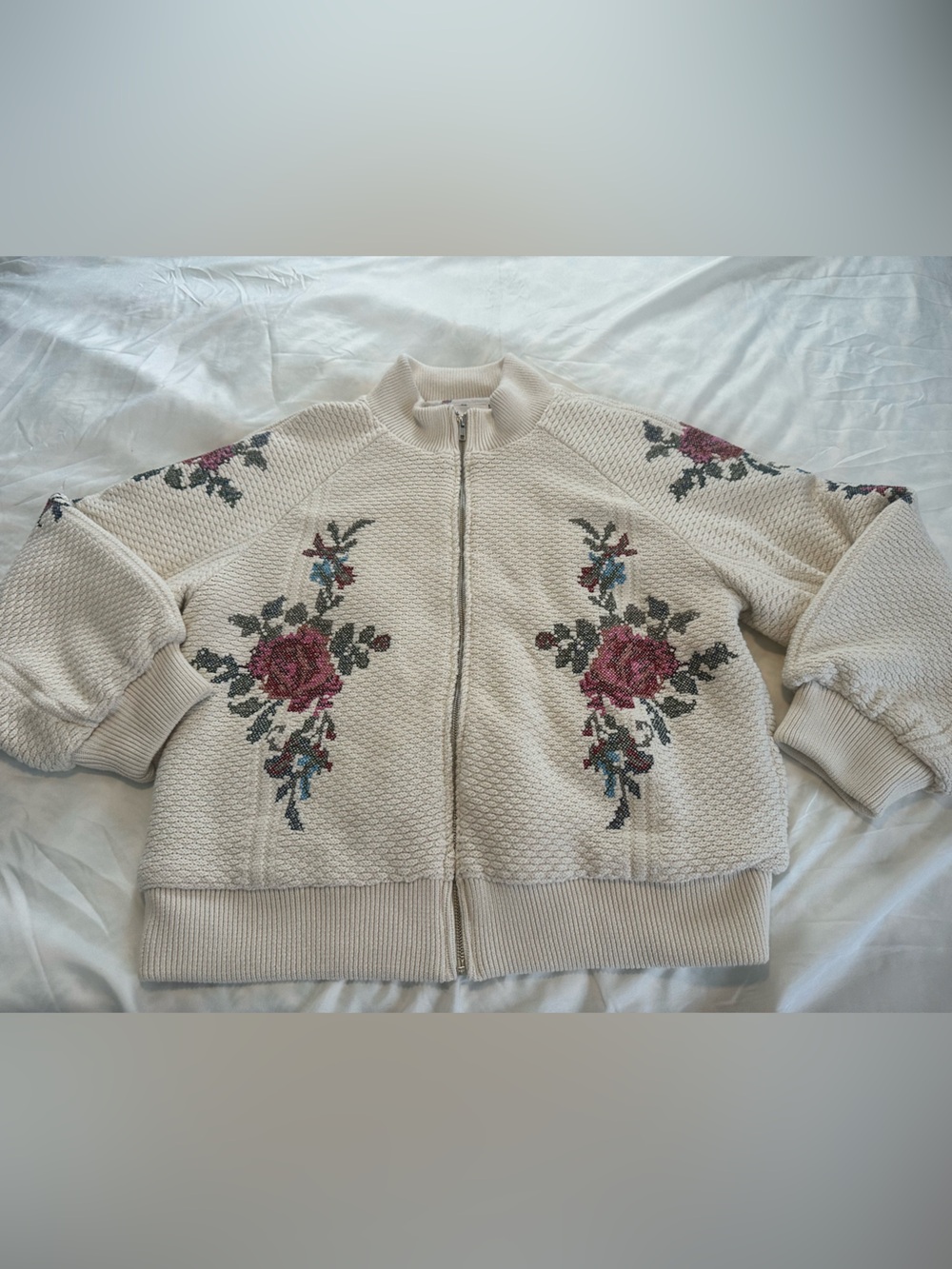 Cream Floral Knit Zip-Front Sweater from Anthropologie.